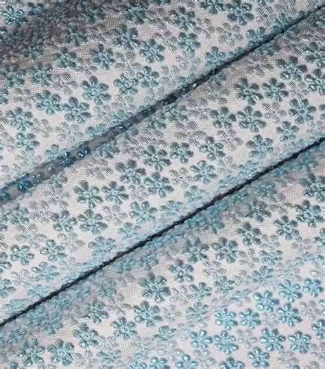 Metallic Blue Ditsy Floral Brocade Knit Fabric by Sew Sweet